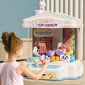 Mini Claw Machine with Music & Lights, 10 Dolls and Game Coins M761